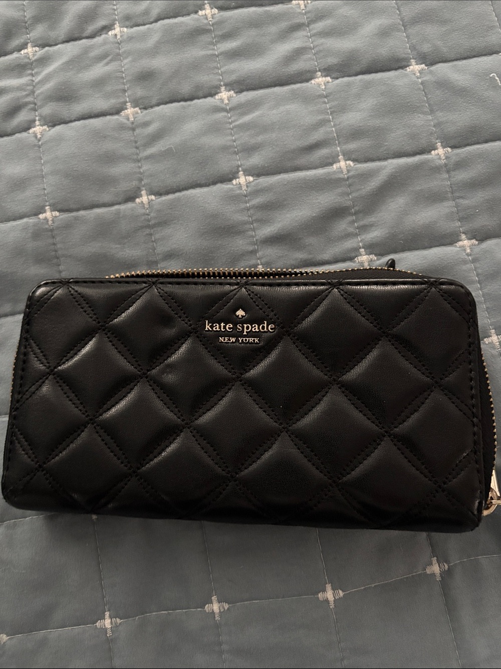 kate spade Black Quilted Zip-Around Wallet with Gold Logo